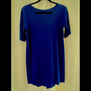 Blue dress with thin black lines.